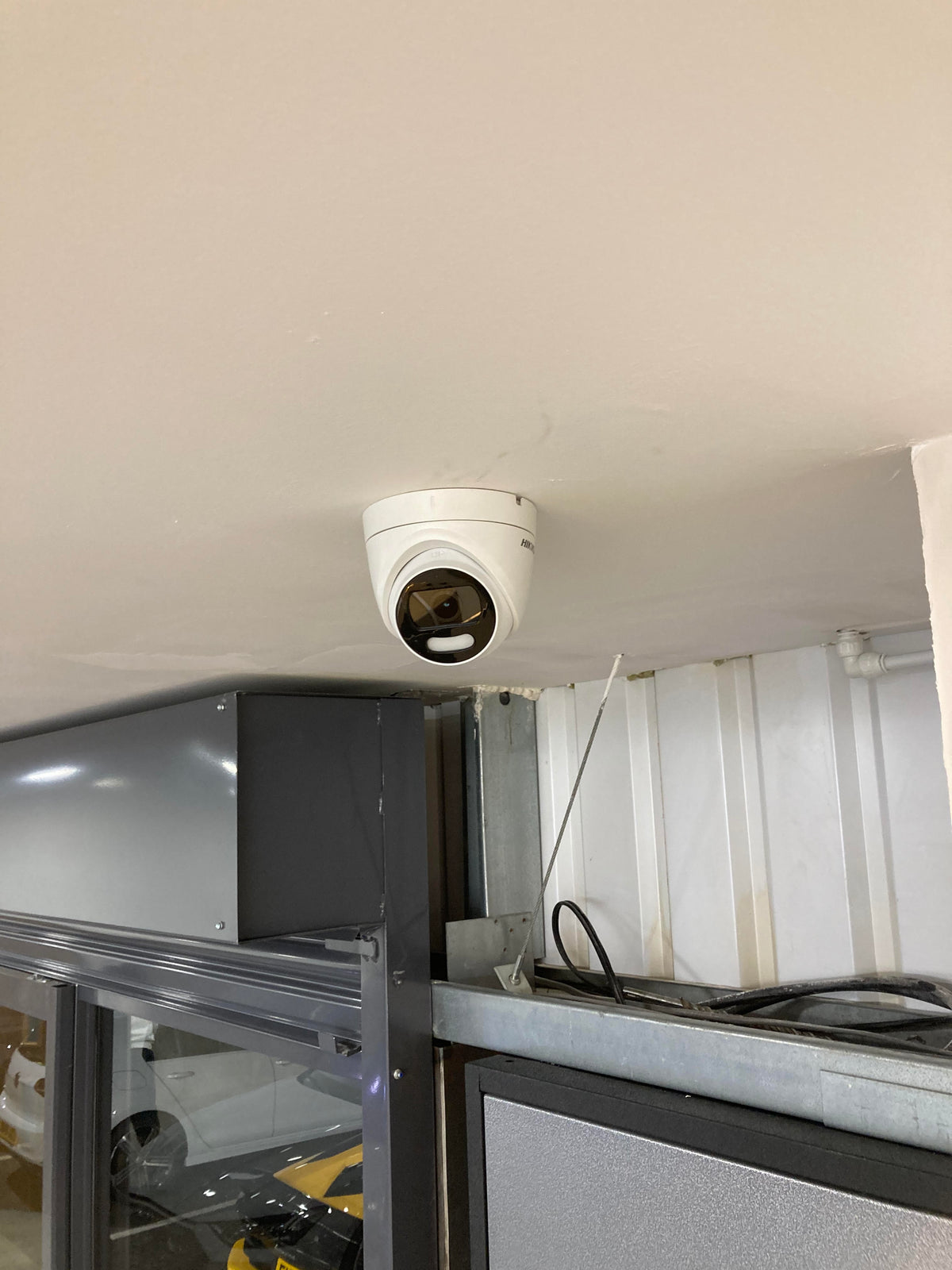 Indoor CCTV camera installed as part of a commercial security system.