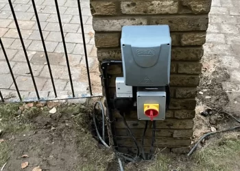 Professional weatherproof outdoor socket installation in Watford garden with IP65 protection